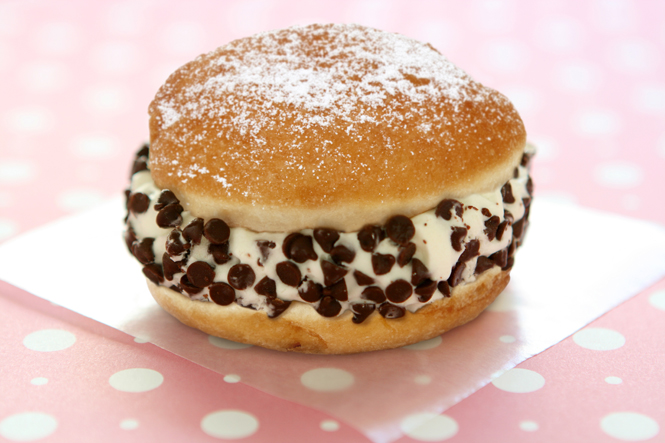 Donut with ice cream and chocolate chips in the middle.